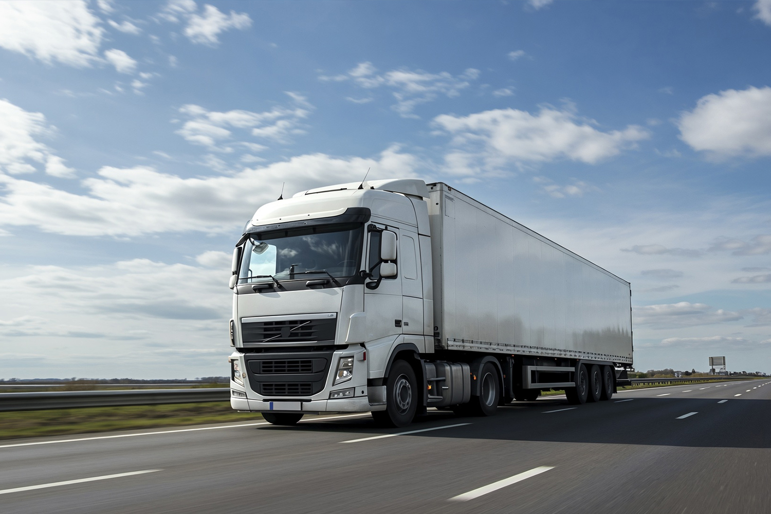 Truck on motorway at sunset